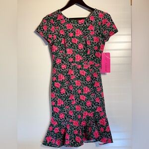 Women’s size 2 Betsey Johnson pencil dress w/ flirty ruffle at bottom. Pink/gray